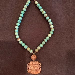 Turquoise stones with Tribal charm